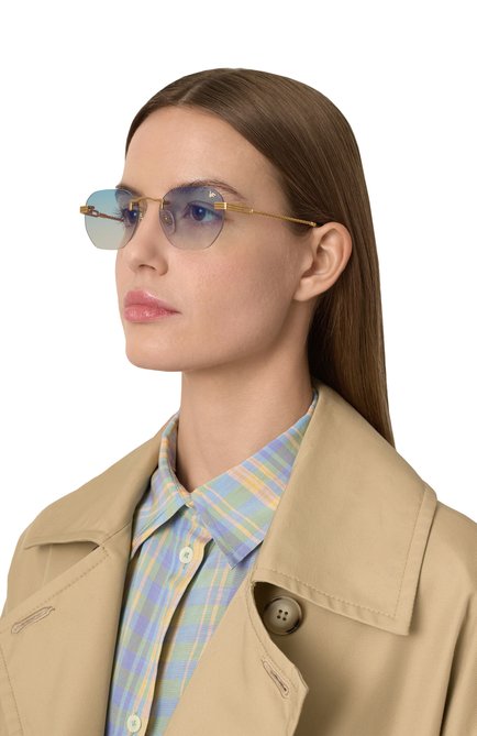 Женские солнцезащитные очки VINTAGE FRAMES светло-голубого цвета, арт. DETR0IT PLAYER 24KT G0LD/SKY BLUE | Фото 2 (Нос: Не проставлено; Региональные ограничения белый список (Axapta Mercury): Не проставлено; Материал: Металл; Тип очков: С/з)