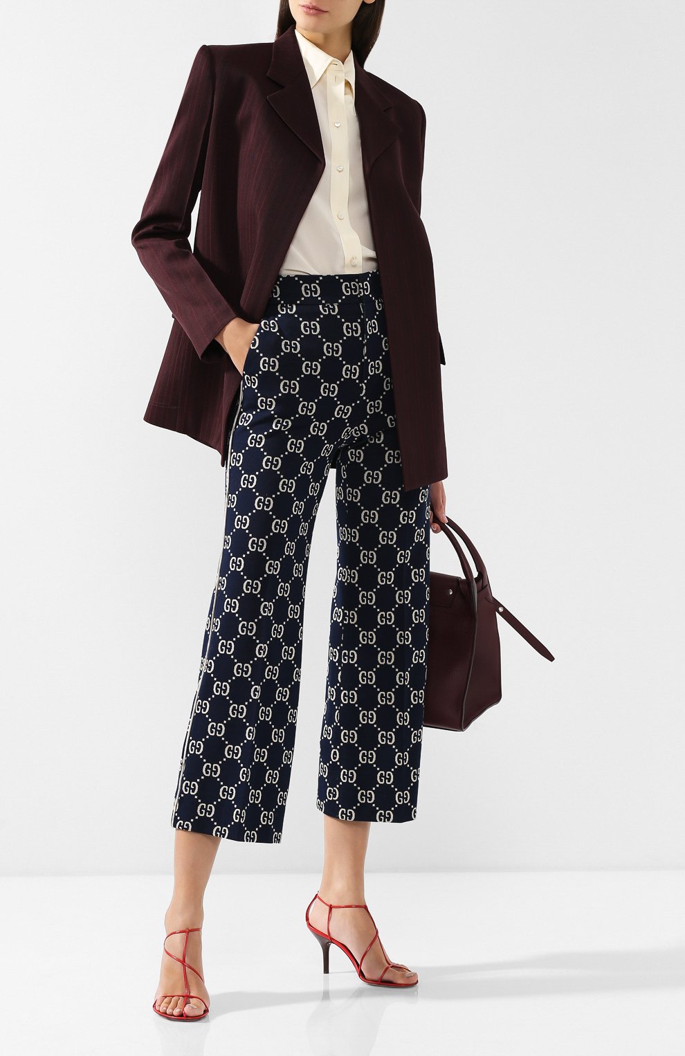 Хлопковые брюки с принтом GUCCI синего цвета по цене 69950 руб., арт. 523573/Z372F, фото 2 Хлопковые брюки с принтом GUCCI, арт. 523573/Z372F, фото 2