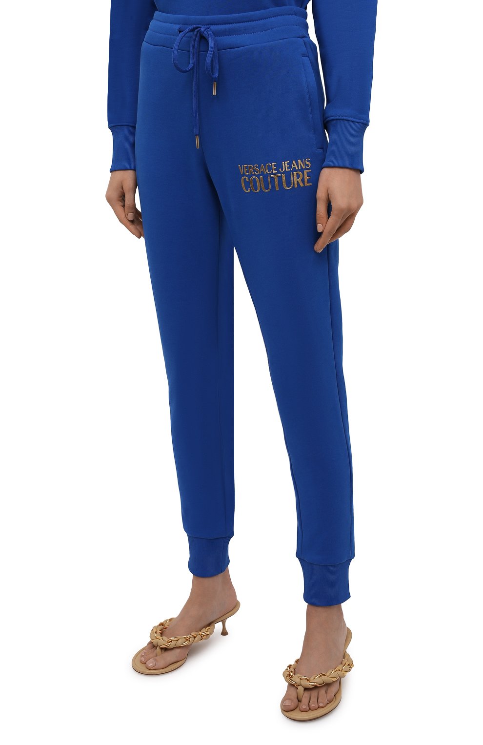 Хлопковые джоггеры VERSACE JEANS COUTURE синего цвета по цене 19300 руб., арт. 71HAAT04-71DP310 L0G0 F0IL S C0TT0N/CF00T, фото 3 Хлопковые джоггеры VERSACE JEANS COUTURE, арт. 71HAAT04-71DP310 L0G0 F0IL S C0TT0N/CF00T, фото 3