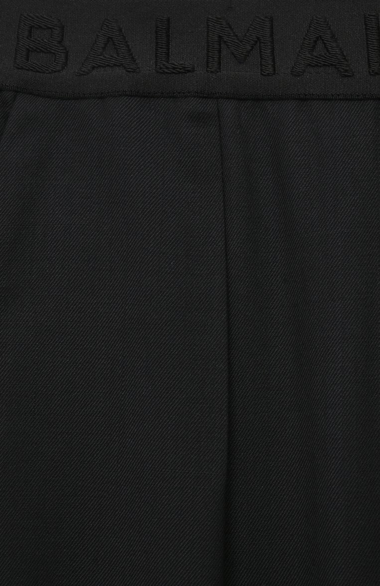 Детские шерстяные брюки BALMAIN черного цвета, арт. BU6R30 | Фото 3 (Материал сплава: Проставлено; Нос: Не проставлено; Материал внешний: Шерсть; Стили: Классический; Девочки-школьная форма: Брюки; Ростовка одежда: 8 лет | 128 см, 10 - 11 лет | 140 - 146см, 16 лет | 164 см, 13 - 15 лет | 158 см, 12 лет | 152 см)