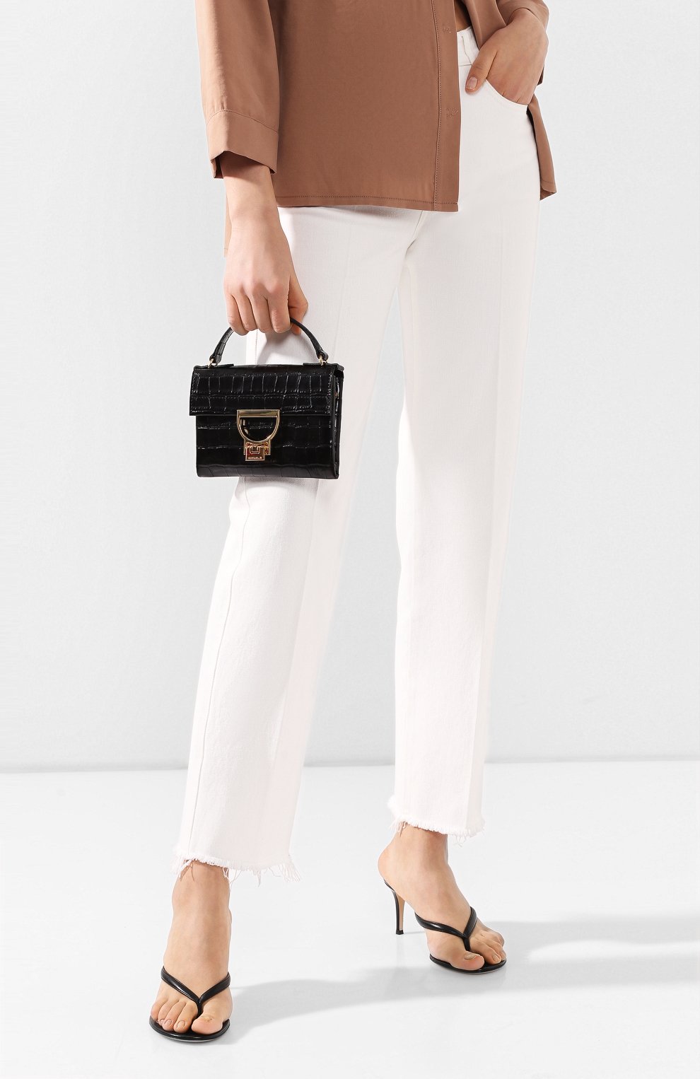 Сумка mignon mini COCCINELLE черного цвета по цене 25600 руб., арт. E1 F32 55 01 01, фото 2 Сумка mignon mini COCCINELLE, арт. E1 F32 55 01 01, фото 2