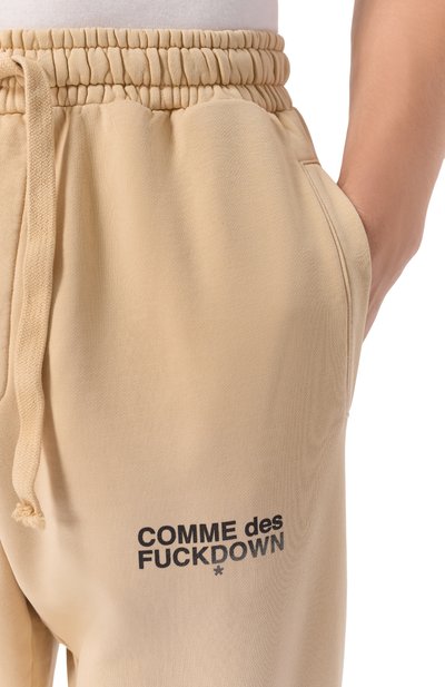 Хлопковые джоггеры COMME DES FUCKDOWN бежевого цвета по цене 14150 руб., арт. CFABM01743, фото 5 Хлопковые джоггеры COMME DES FUCKDOWN, арт. CFABM01743, фото 5