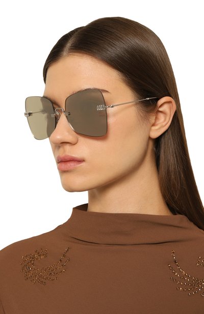 Солнцезащитные очки MIU MIU серого цвета по цене 46000 руб., арт. SMU50W-E1BC-FE02Q-059, фото 2 Солнцезащитные очки MIU MIU, арт. SMU50W-E1BC-FE02Q-059, фото 2