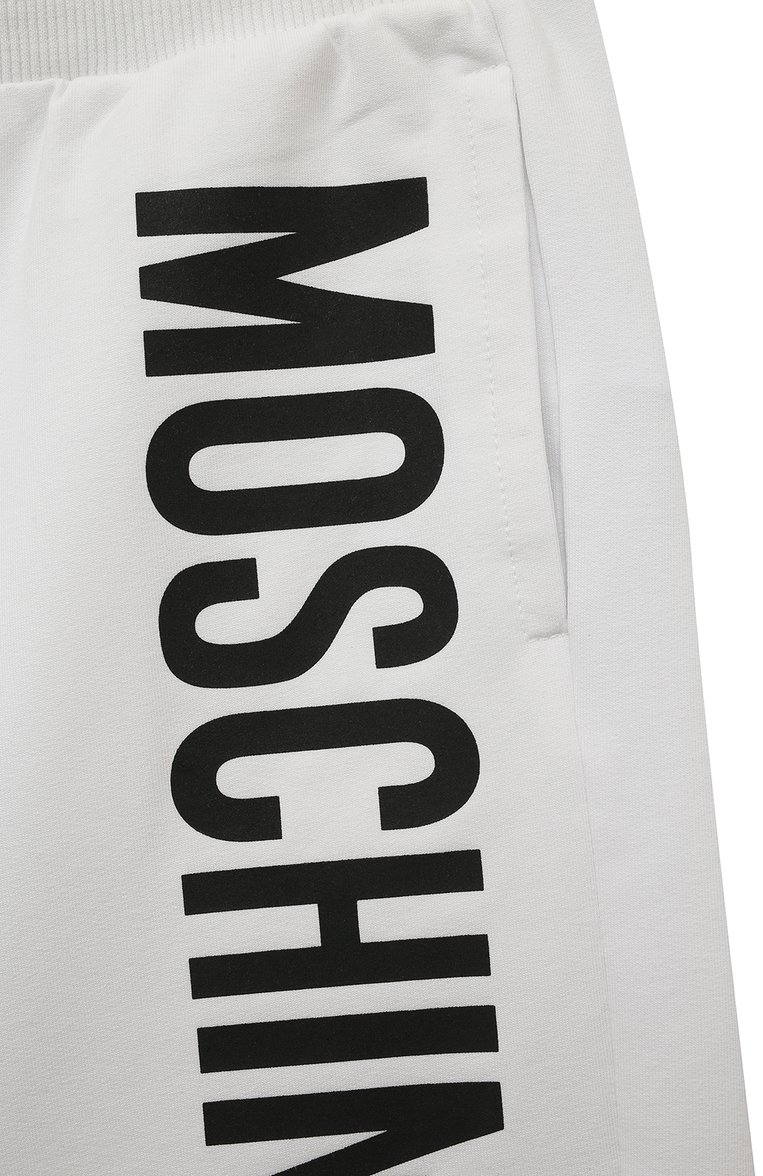 Детские хлопковые шорты MOSCHINO белого цвета, арт. HPQ007/LDA27/4-8 | Фото 3 (Материал внешний: Хлопок; Случай: Повседневный; Нос: Не проставлено; Ростовка одежда: 4 года | 104 см, 5 лет | 110 см, 6 лет | 116 см, 8 лет | 128 см)