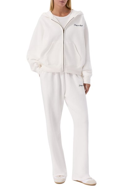 Хлопковые брюки SPORTY AND RICH белого цвета по цене 32200 руб., арт. PA071712326WH01, фото 2 Хлопковые брюки SPORTY AND RICH, арт. PA071712326WH01, фото 2