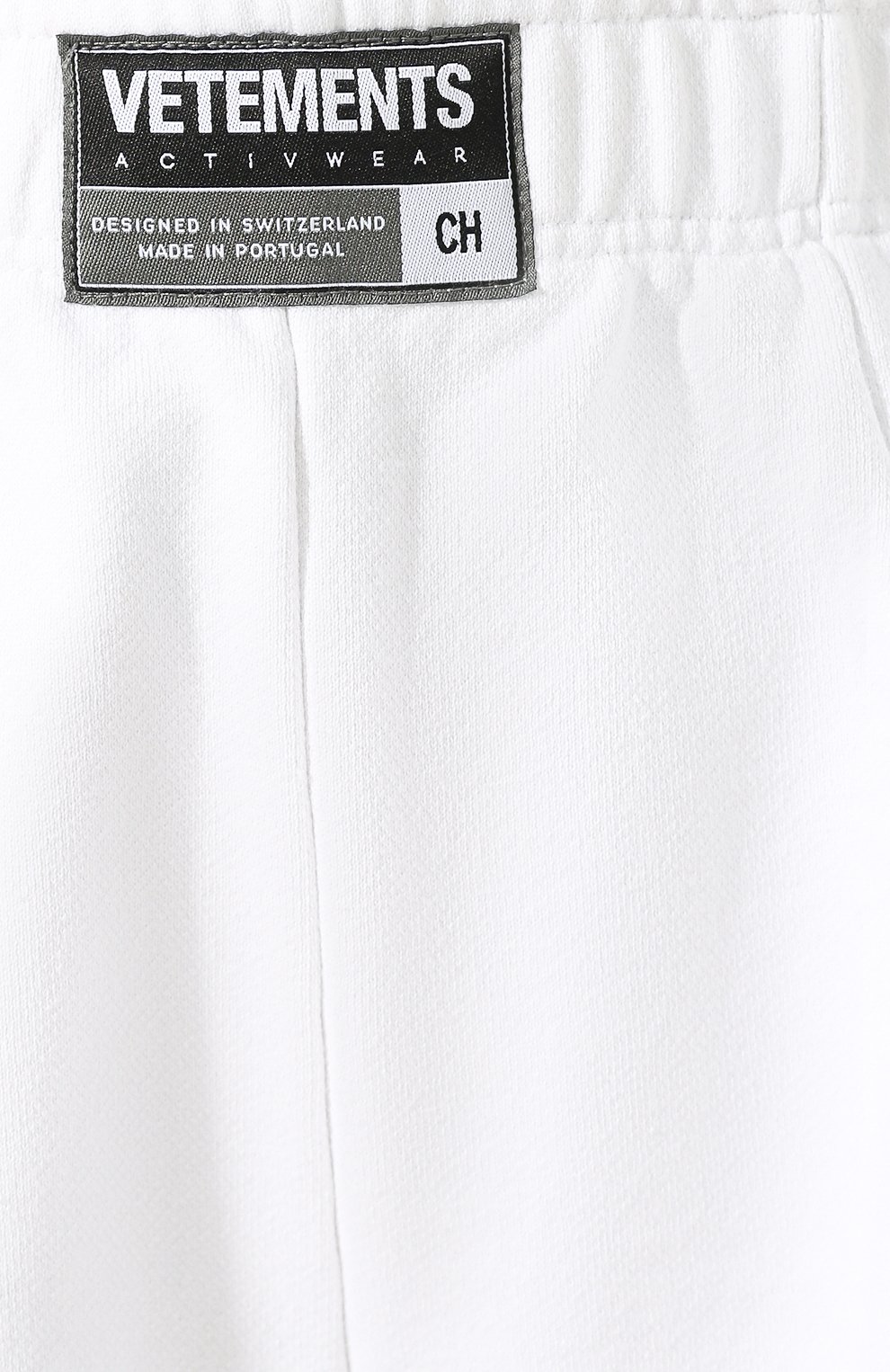 Хлопковые брюки VETEMENTS белого цвета по цене 56400 руб., арт. SS20PA135 1624/W/WHITE, фото 5 Хлопковые брюки VETEMENTS, арт. SS20PA135 1624/W/WHITE, фото 5