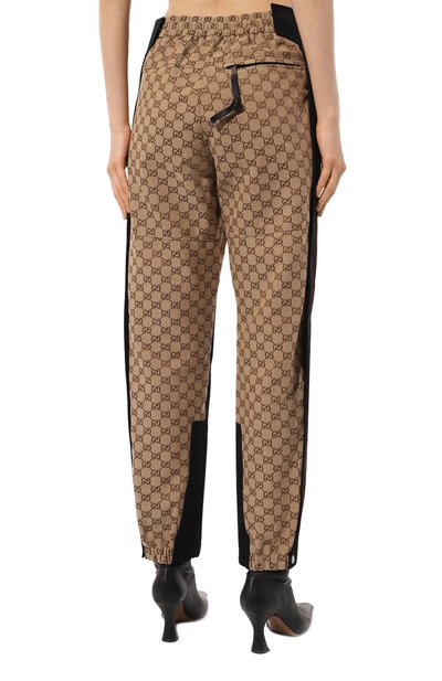 Джоггеры the north face x gucci GUCCI бежевого цвета по цене 172800 руб., арт. 671191 ZAHP0, фото 4 Джоггеры the north face x gucci GUCCI, арт. 671191 ZAHP0, фото 4