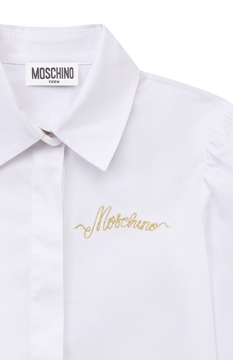 Детское хлопковая блузка MOSCHINO белого цвета, арт. HDC01M/N0Z73/10A-14A | Фото 3 (Материал сплава: Проставлено; Драгоценные камни: Проставлено; Материал внешний: Хлопок; Рукава: Длинные; Стили: Классический)