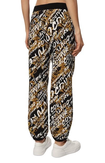 Хлопковые джоггеры VERSACE JEANS COUTURE черно-белого цвета по цене 44650 руб., арт. 73HAA320-73DP320 FELPA GARZATA PR./FS048, фото 4 Хлопковые джоггеры VERSACE JEANS COUTURE, арт. 73HAA320-73DP320 FELPA GARZATA PR./FS048, фото 4